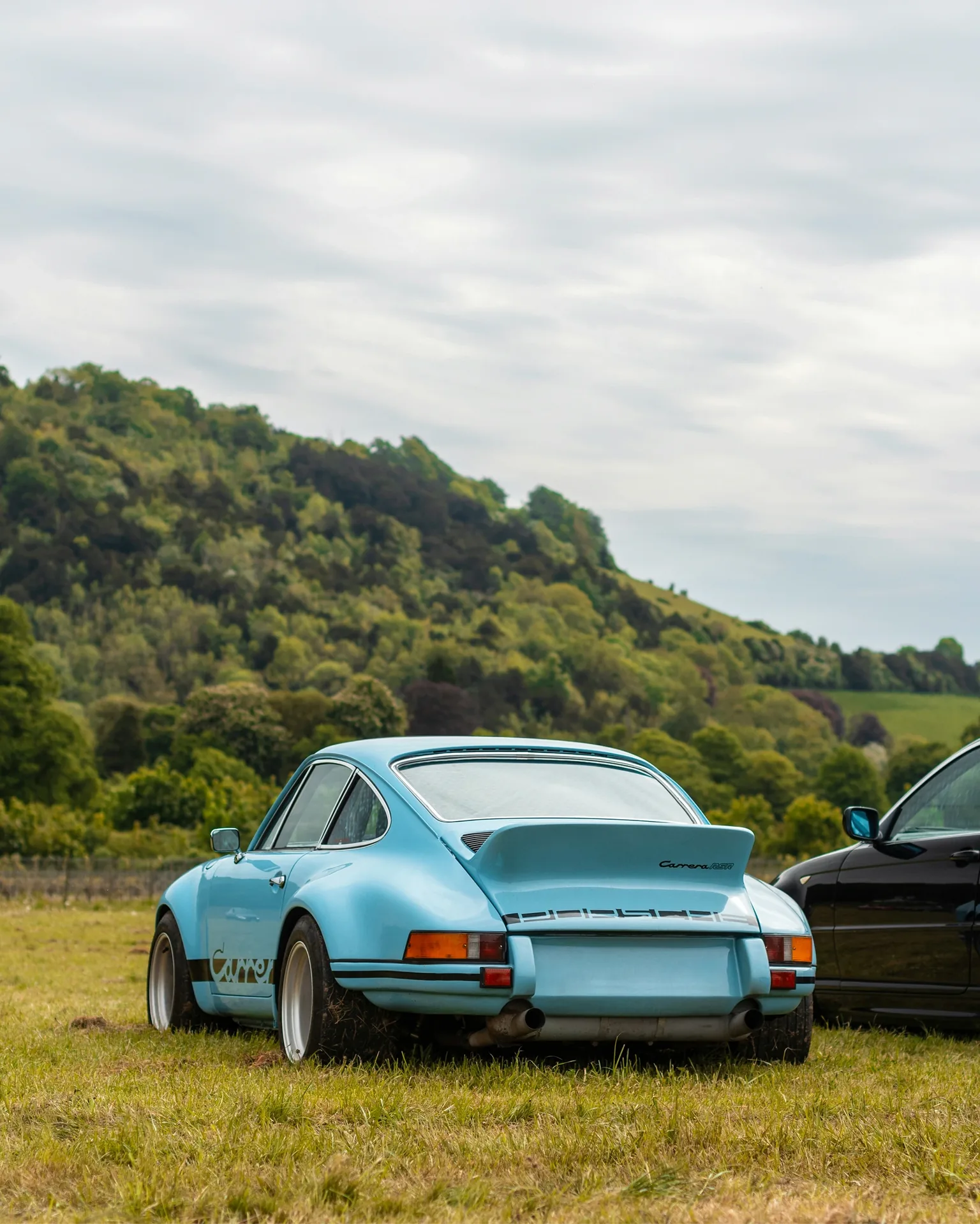 Air-cooled Porsche Carrera RSR at a countryside meet